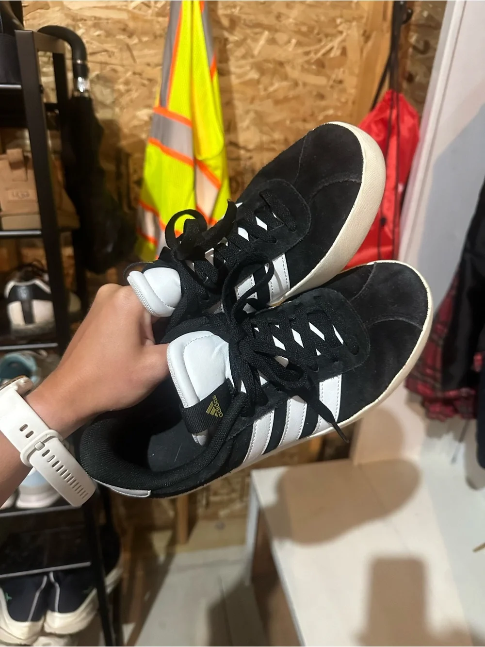 Women’s black adidas sneakers